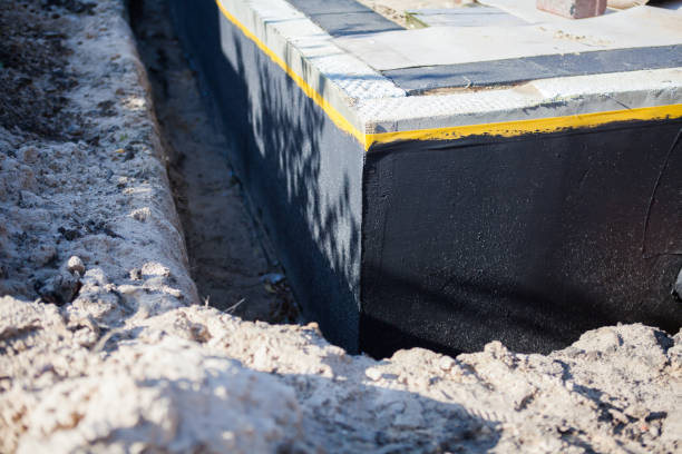 Professional Exterior Waterproofing technician working in Hillsborough, NC